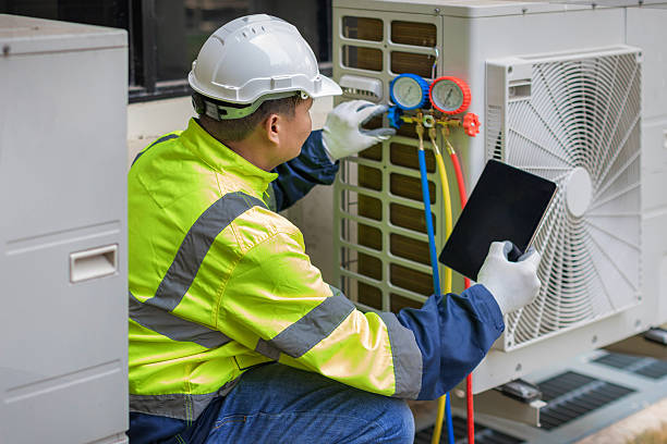 Professional Ductwork Repair technician working in Aquebogue, NY